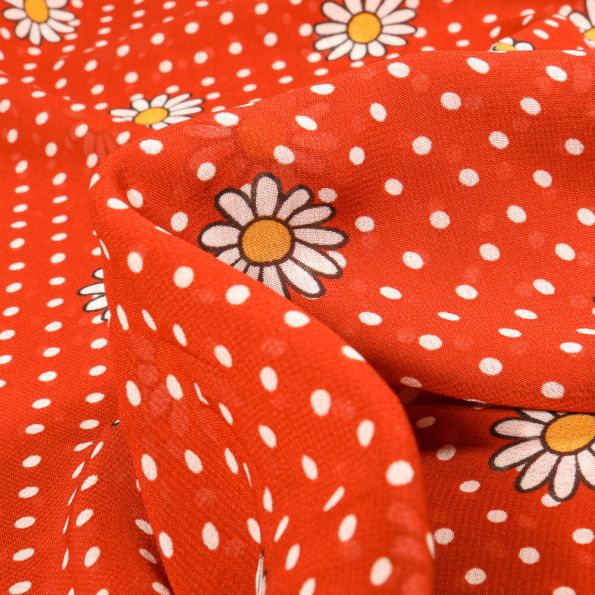 Tissu Mousseline Marguerites sur fond Orange - Par 10 cm