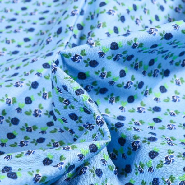Tissu Coton imprimé Rosa sur fond Bleu - Par 10 cm