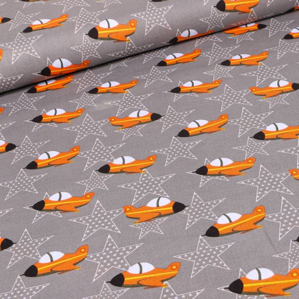 Tissu Coton imprimé Avions militaires et étoiles sur fond Gris foncé - Par 10 cm