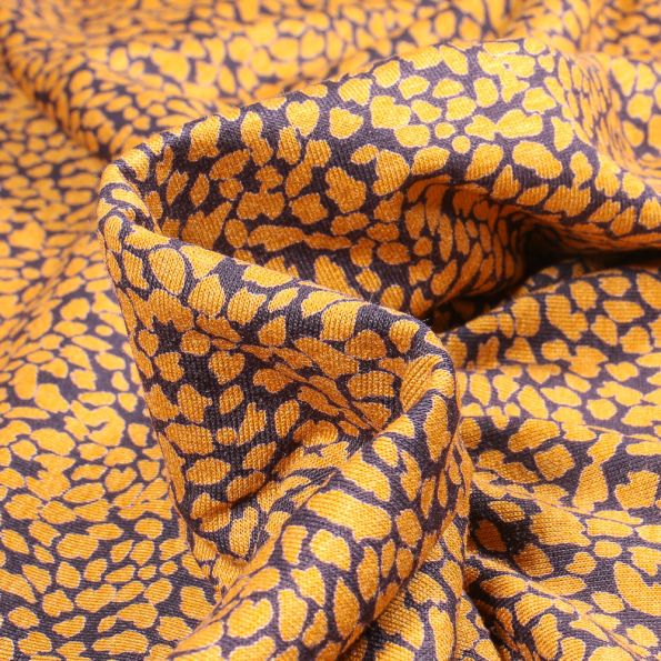 Tissu Jersey Viscose Alba Taches jaunes sur fond Noir - Par 10 cm