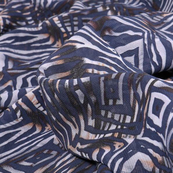 Tissu Mousseline Leila sur fond Bleu marine - Par 10 cm