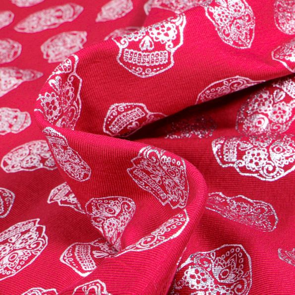 Tissu Jersey Coton Têtes de morts métallisées sur fond Rouge - Par 10 cm