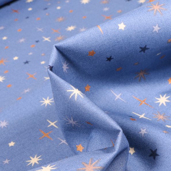 Tissu Coton imprimé Etoiles scintillantes sur fond Bleu - Par 10 cm