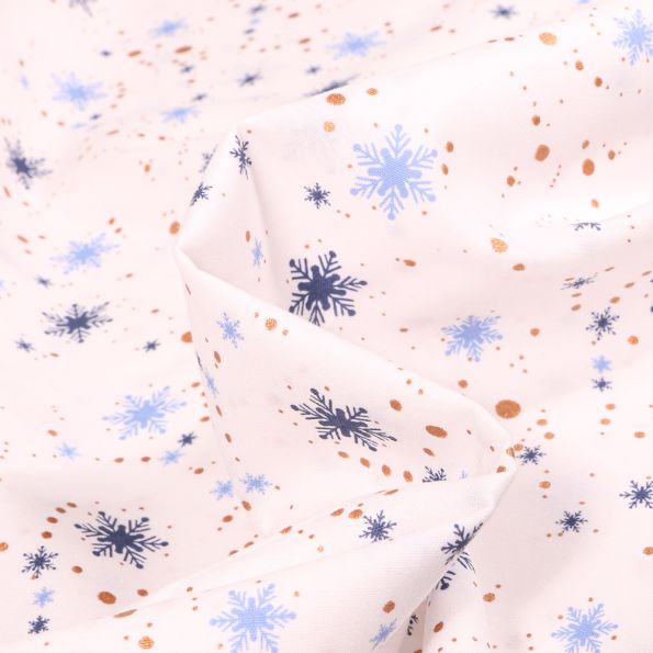 Tissu Coton imprimé Flocons de neige et étoiles sur fond Blanc cassé - Par 10 cm