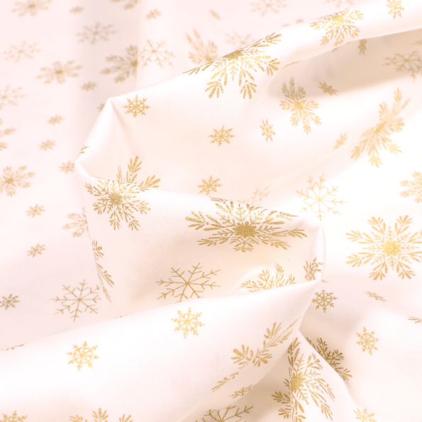 Tissu Coton imprimé Flocons de neige dorés sur fond Blanc - Par 10 cm