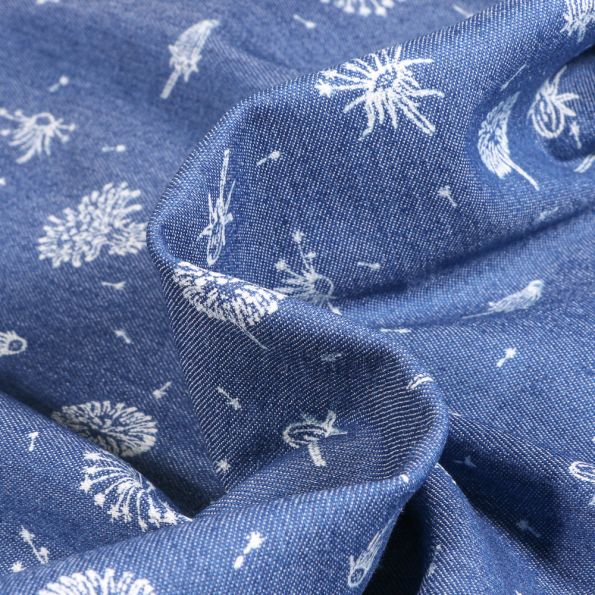 Tissu Jean Denim extensible Pissenlits et pétales sur fond Bleu denim - Par 10 cm