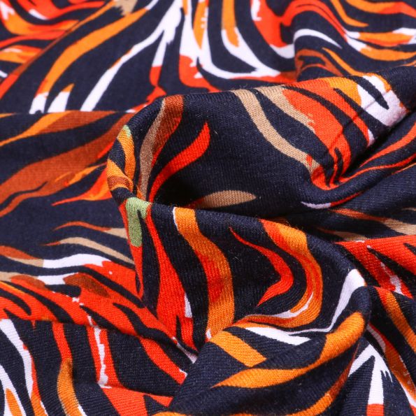 Tissu Jersey Viscose Lignes abstraites colorées sur fond Bleu marine - Par 10 cm