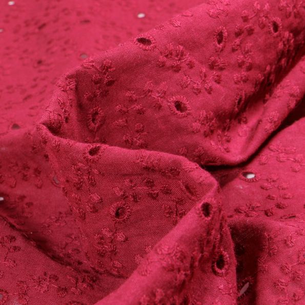 Tissu Broderie anglaise coton ajouré uni Andrea sur fond Framboise - Par 10 cm