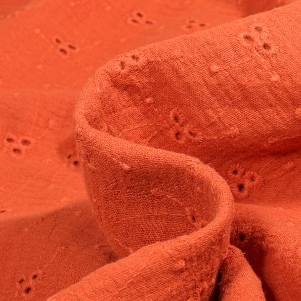 Tissu Double gaze ajouré brodé Lou sur fond Orange - Par 10 cm