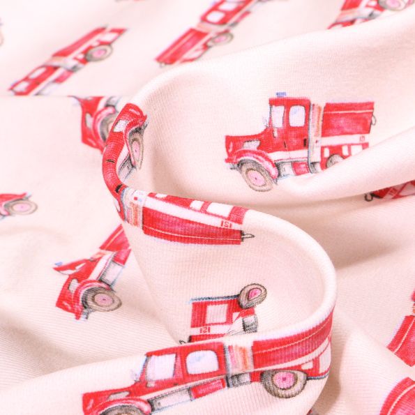 Tissu Jersey Coton Bio Camion pompier sur fond Ecru - Par 10 cm