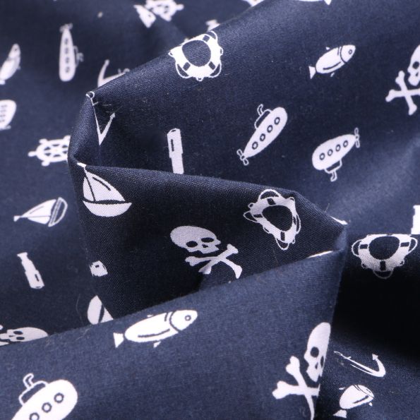 Tissu Coton imprimé Nautique et têtes de mort sur fond Bleu marine - Par 10 cm