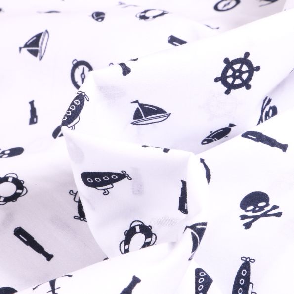 Tissu Coton imprimé Motifs marins et têtes de mort sur fond Blanc - Par 10 cm