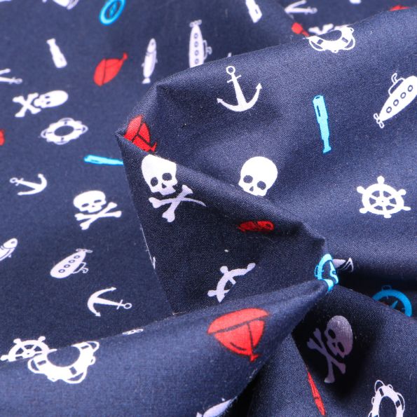 Tissu Coton imprimé Motifs marins et têtes de mort sur fond Bleu marine - Par 10 cm
