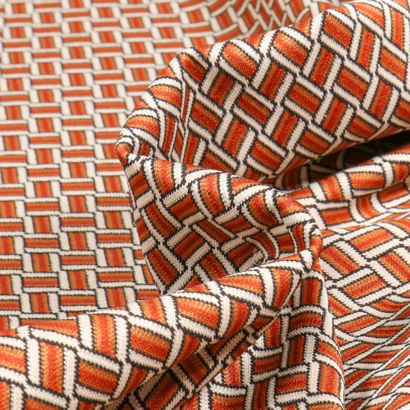 Tissu Maille Jacquard Zig zag sur fond Brique - Par 10 cm