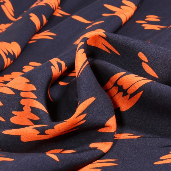 Tissu Viscose Abstrait orange sur fond Bleu marine - Par 10 cm
