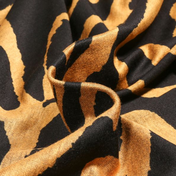 Tissu Jersey Milano Christina ocre sur fond Noir - Par 10 cm