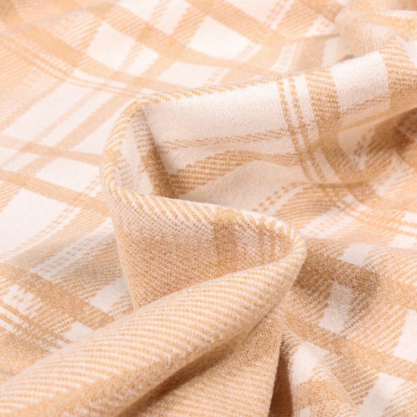 Tissu Maille lourde Charlotte sur fond Beige - Par 10 cm