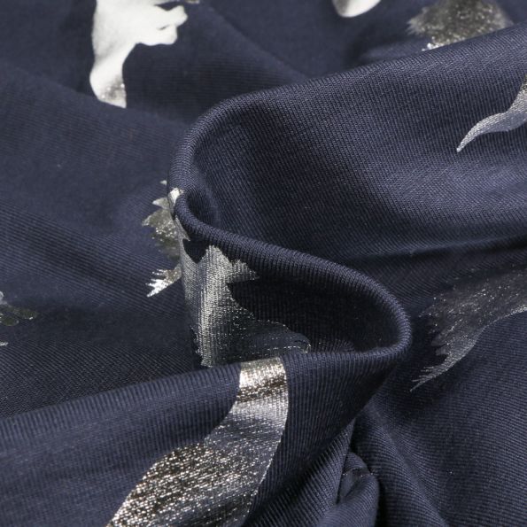 Tissu Jersey Coton Dino métalissé argenté sur fond Bleu marine - Par 10 cm