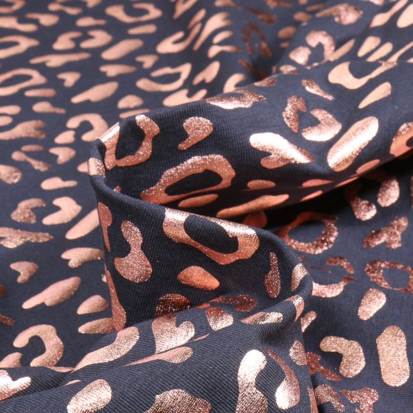 Tissu Jersey Coton Léo rose gold sur fond Bleu marine - Par 10 cm