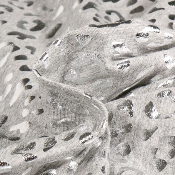 Tissu Jersey Coton Léo métalissé sur fond Gris clair chiné - Par 10 cm