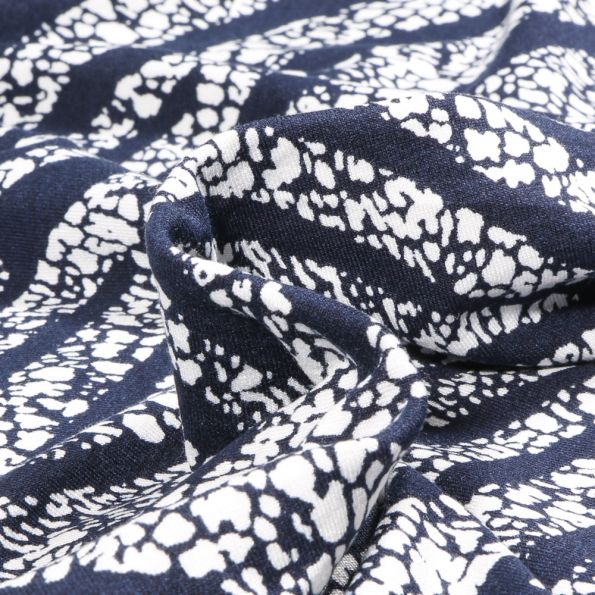 Tissu Jersey Viscose Vortex sur fond Bleu marine - Par 10 cm