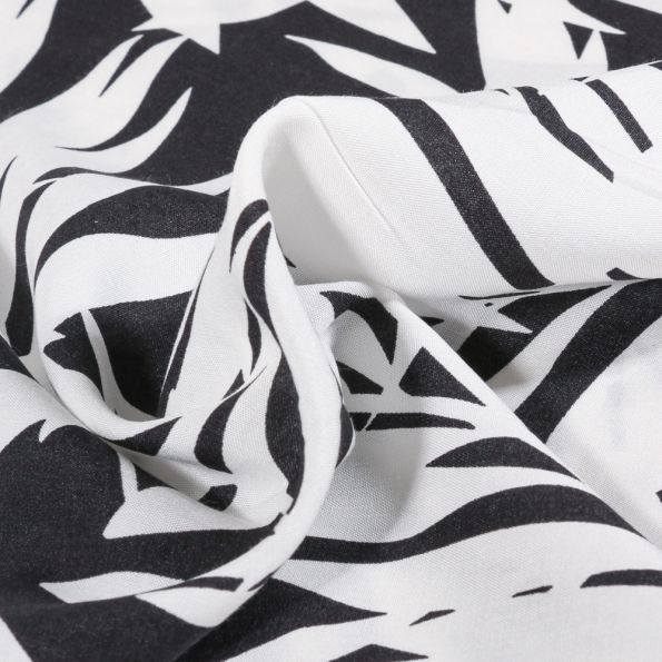 Tissu Viscose Palma sur fond Bleu marine - Par 10 cm