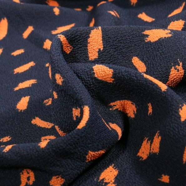 Tissu Crêpe Georgette Denisa sur fond Bleu marine - Par 10 cm