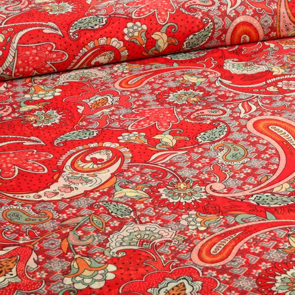 Tissu Mousseline Paisley sur fond Rouge - Par 10 cm
