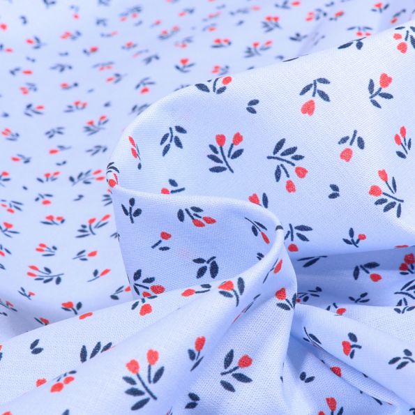 Tissu Coton imprimé Mallory sur fond Bleu ciel - Par 10 cm