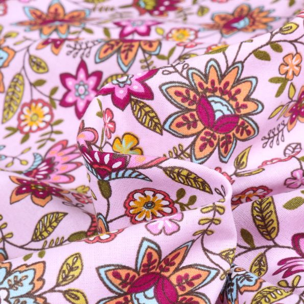Tissu Coton imprimé Amaël sur fond Rose pâle - Par 10 cm