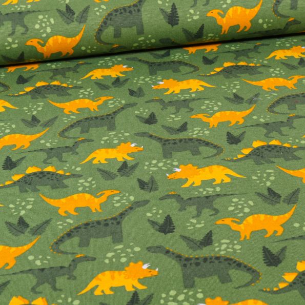 Tissu Jersey Coton Dinosaures verts et jaunes sur fond Vert - Par 10 cm