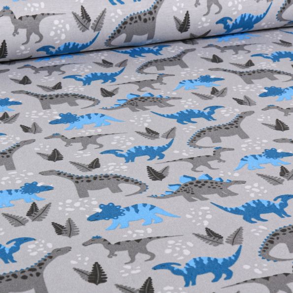 Tissu Jersey Coton Dinodino sur fond Gris clair - Par 10 cm