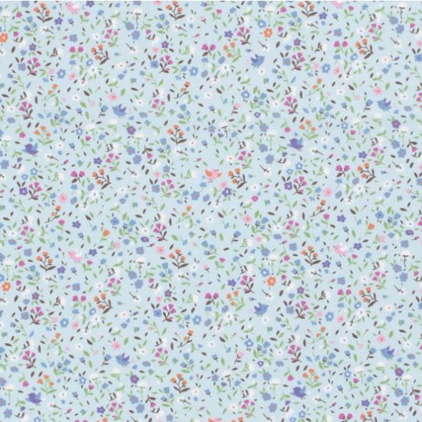 Tissu Coton imprimé Evie sur fond Bleu ciel - Par 10 cm