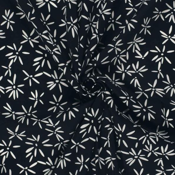 Tissu Coton extensible Pissenlit mode sur fond Bleu marine - Par 10 cm