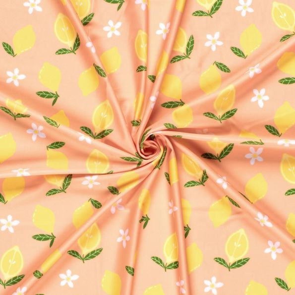 Tissu Lycra maillot de bain citron Zestiva jaune sur fond Pêche - Par 10 cm