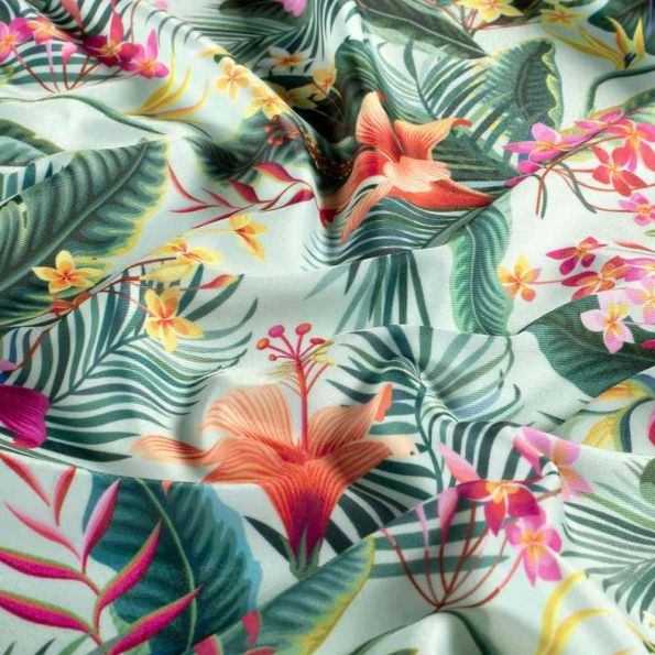 Tissu Lycra maillot de bain tropical Calypso sur fond Vert d'eau - Par 10 cm