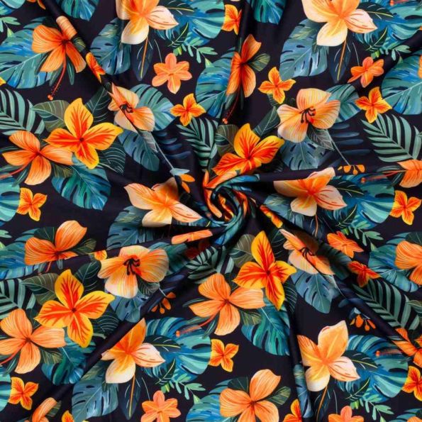 Tissu Lycra maillot de bain  fleurs Tropicaz sur fond Bleu marine - Par 10 cm