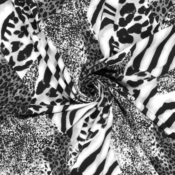 Tissu Jersey milano maille lourde Ponte di Roma motifs Panthère sur fond Blanc - Par 10 cm