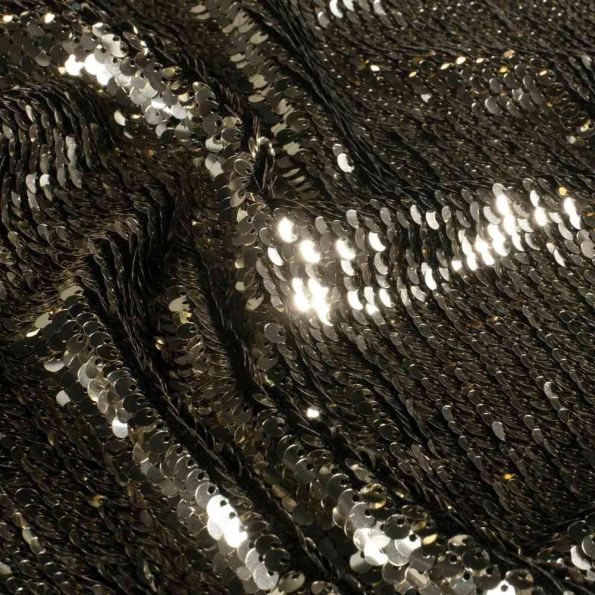 Tissu Sequins magique Luxa extensible sequins Dorés sur fond Noir - Par 10 cm