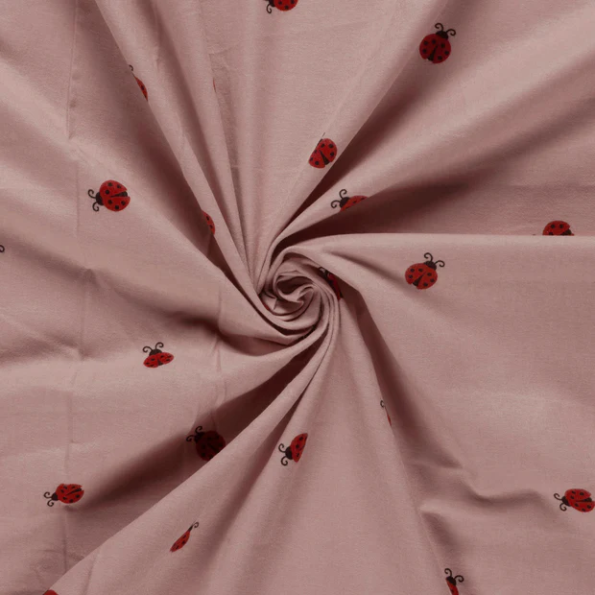Tissu Flanelle de Coton Léonie coccinelles Rouges sur fond Rose poudré - Par 10 cm