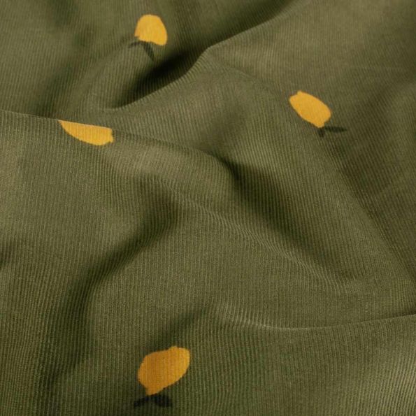 Tissu Velours milleraies Séna citrons Jaunes sur fond Vert kaki foncé - Par 10 cm