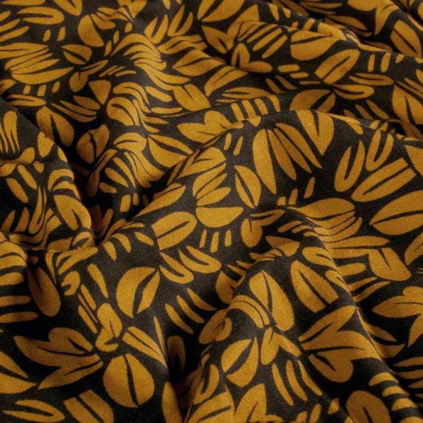 Tissu Sweat léger French Terry Emily feuillages stylisés Moutarde sur fond Noir - Par 10 cm