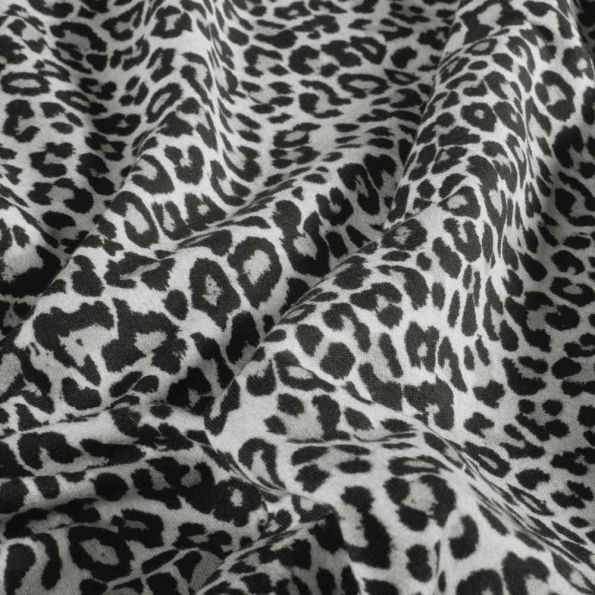 Tissu Sweat léger French Terry Maïa extensible léopard Noir sur fond Blanc - Par 10 cm