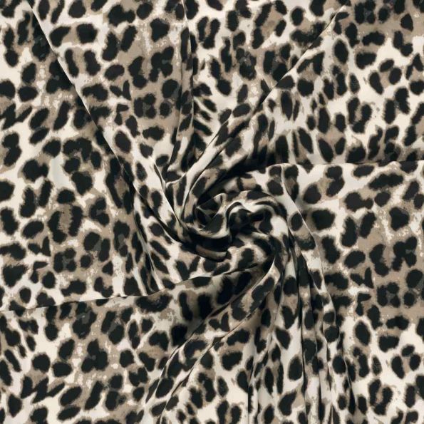 Tissu Satin Duchesse Felindra motifs léopard sur fond Blanc - Par 10 cm