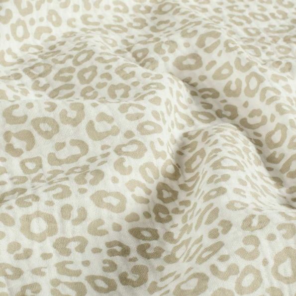Tissu Double gaze de Coton motif panthère Beige sur fond Blanc cassé - Par 10 cm