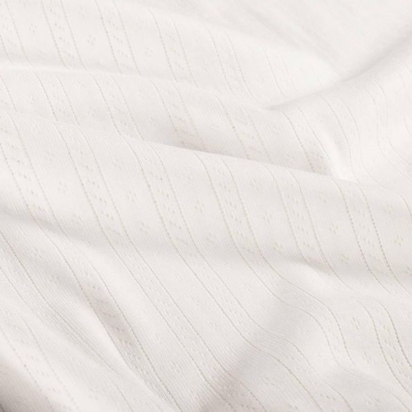 Tissu Jersey Coton ajouré Camille uni Blanc cassé - Par 10 cm