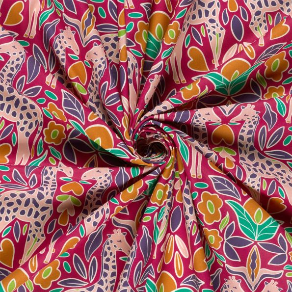Tissu Popeline de Coton imprimé Girafes fleuris sur fond Framboise - Par 10 cm