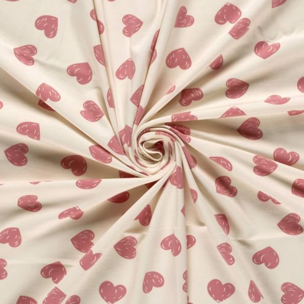 Tissu Jersey Coton imprimé Cœur tendre sur fond Rose pastel - Par 10 cm