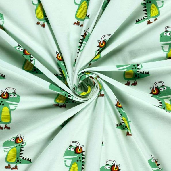 Tissu Jersey Coton imprimé Dino stylé sur fond Vert menthe - Par 10 cm