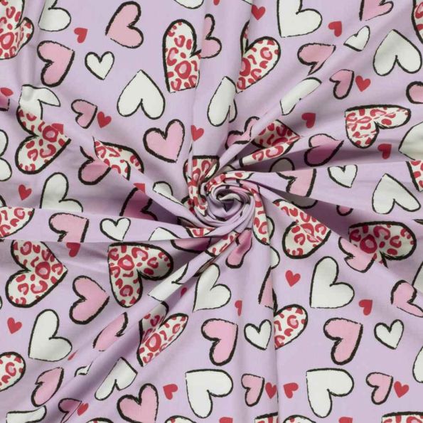 Tissu Jersey Coton imprimé Coeurs léo sur fond Parme - Par 10 cm